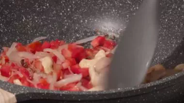 Shahi paneer in rich creamy gravy garnished with cream